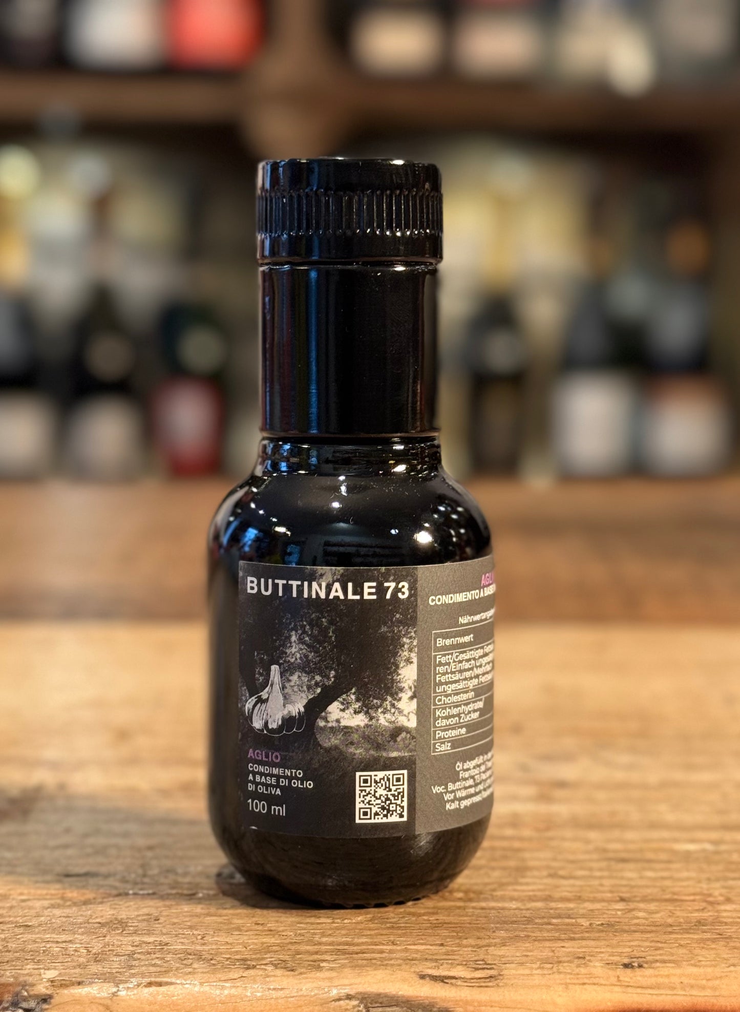 BUTTINALE 73 - Aglio-  condimento a base di olio di oliva